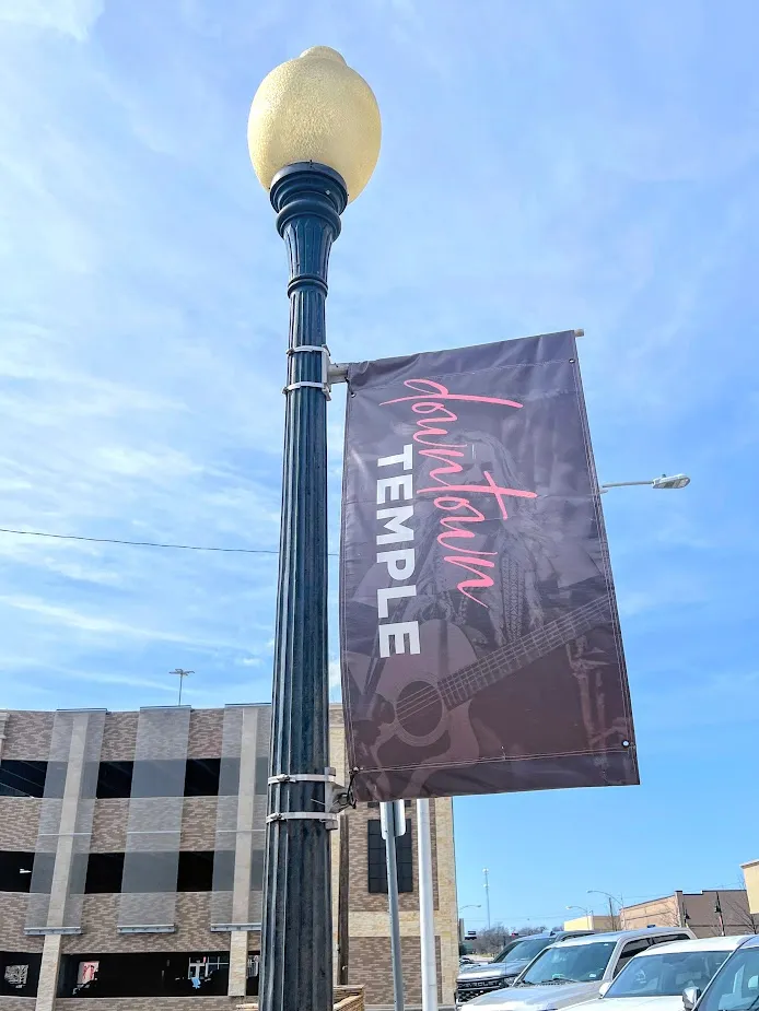 image of light post with downtown temple wording attached to the side