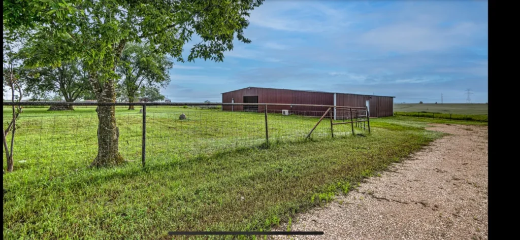 Top Mistakes Buyers Make When Purchasing Land in Texas (And How to Avoid Them) 4 photograph of land and building